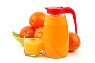 Full glass and Jug of orange juice on white background