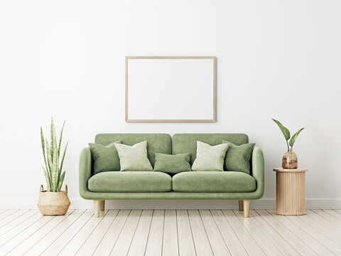 Horizontal wooden frame mockup in living room interior with green velvet couch, slat side table and plants on empty white wall background. Illustration, 3d rendering