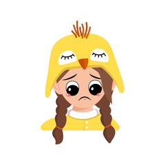 Girl with big eyes and sad emotions, depressed face, down eyes in cute yellow chicken hat. Head of child with melancholy expression for Easter, New Year or costume for party. Vector flat illustration