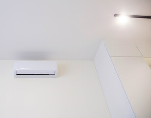 Wall mounted air conditioner in a modern apartment. The concept of maintaining a comfortable room...