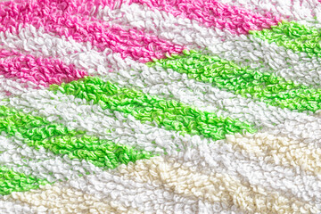 Multicolor fleece fabric with stripes, macro. Backdrop style
