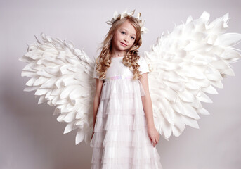 Pretty young lady with angel wings