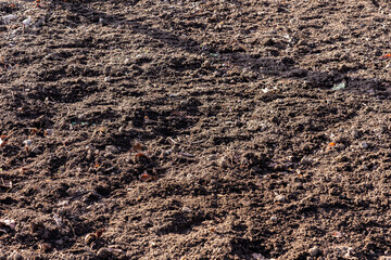 A very fertile empty ground has been ploughed and prepared for planting
