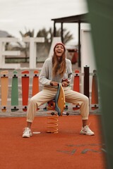 woman in a dress at the playground 