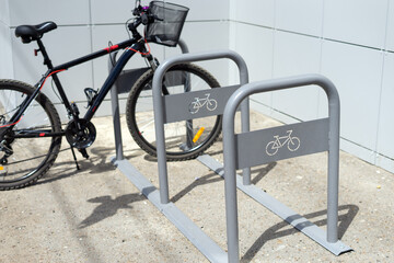 Bicycle parking near the store in the city.
