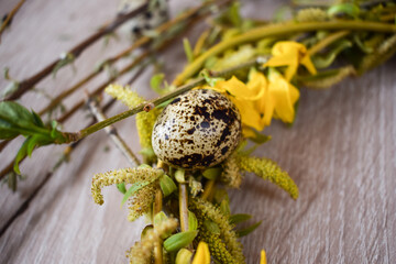 Quial egg on the spring wreath. Easter table decoration