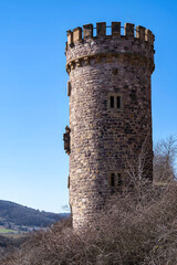 Fototapeta na wymiar The Ajax Tower in the vineyards of Siefersheim/Germany on a sunny spring day 