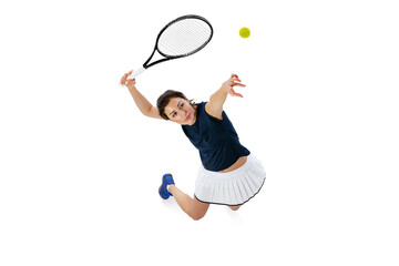 Aerial view of young beautiful girl, tennis player in sportswear playing tennis isolated on white background. Beauty, sport concept.
