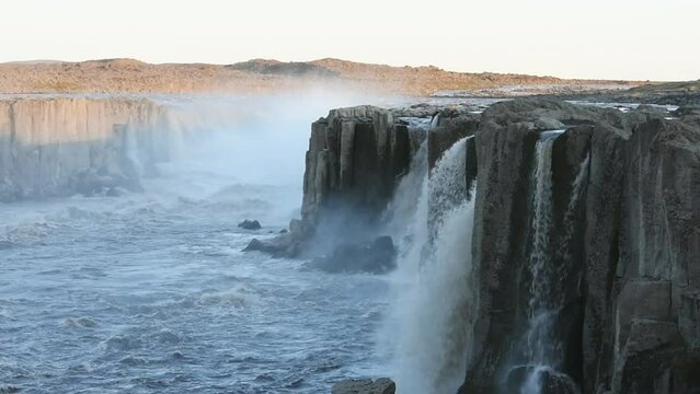 Landscape of water crashing at Gullfoss multiple waterfalls in Iceland