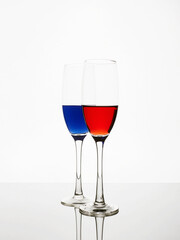  red and blue liquids in glasses. beautiful still life