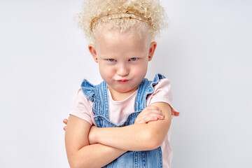 Naughty caucasian child. Disobedience problem. Discipline punishment. Portrait of angry offended...