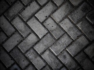 Gray paving slabs with copy space that can be used as a background. Paving slabs top view.