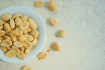 nuts in a bowl on a kitchen top 