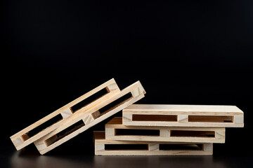 wooden паллет euro type souvenir to on black background