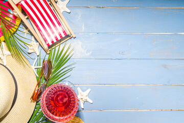 Summer beach holiday  vacation and travel background with deck chair, Lifebuoy, cocktail, tropical...