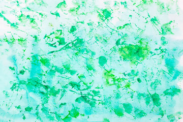 Abstract background of hand drawn watercolor spots, splashes of green color