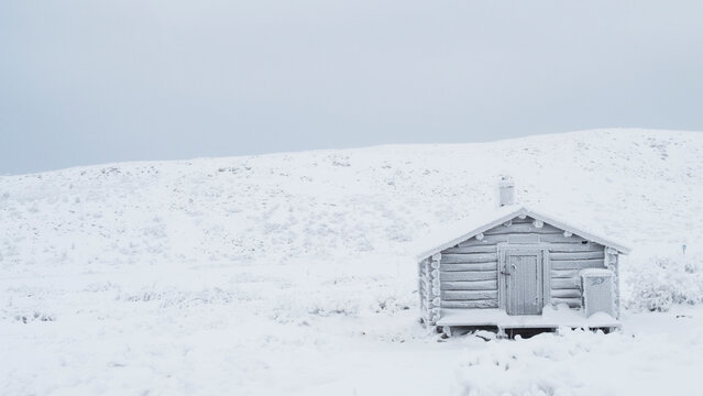 old cabin in the snow