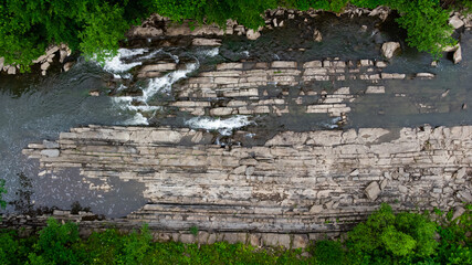Stone wall in the river