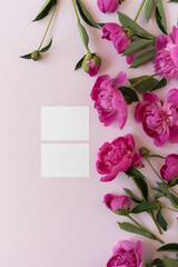 Blank branding paper cards with mockup copy space. Abstract floral background. Colourful pink peony flowers background. Flowers and petals. Delicate aesthetic artistic botany template