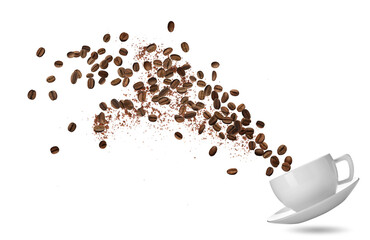 Cup and aromatic roasted coffee beans flying on white background