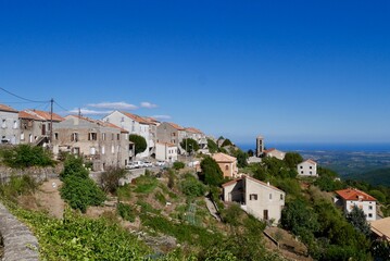 Fototapeta na wymiar Antisanti, dreamy village nestled in the mountains of Castagniccia overlooking the Mediterranean Sea. Corsica, France.