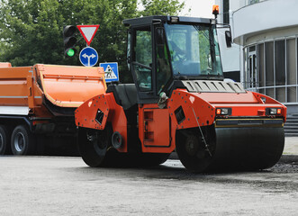 Road repair machinery working on city street