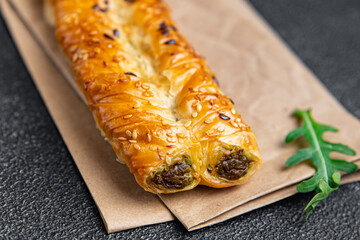 rollini phyllo pastry spinach, cheese, cream cheese savory pastries ready to eat fresh portion dietary healthy meal food diet still life snack on the table copy space food background rustic top view