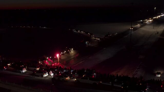 Aerial view of Freedom Convoy 2022 as they pass through Manitoba Canada.  Thousands of people lined up in support of this protest.