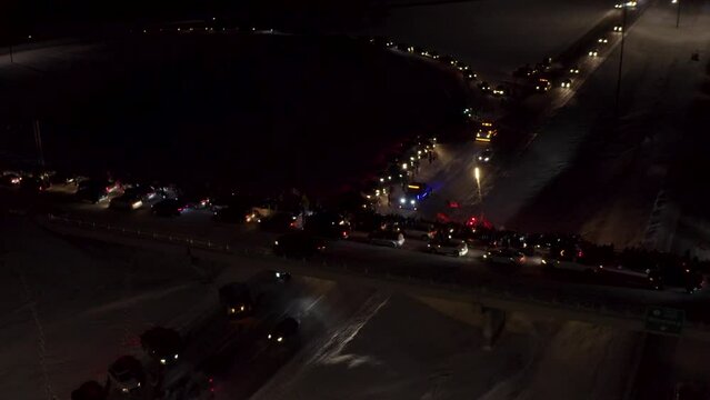 Aerial view of Freedom Convoy 2022 as they pass through Manitoba Canada.  Thousands of people lined up in support of this protest.