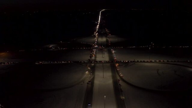 Aerial view of Freedom Convoy 2022 as they pass through Manitoba Canada.  Thousands of people lined up in support of this protest.