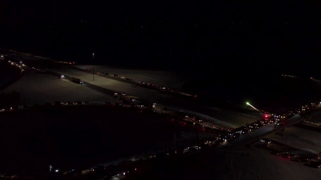 Aerial view of Freedom Convoy 2022 as they pass through Manitoba Canada.  Thousands of people lined up in support of this protest.