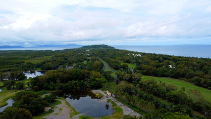 Fototapeta na wymiar Aerial view of rainforrest roads and ocean in Port Douglas