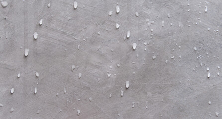 rain drops on cement wall background 