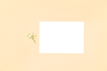 Horizontal blank white card 5x7 with a flower