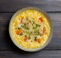 Risotto with pumpkin, cheese and thyme. Vegetarian food. Healthy eating.