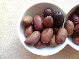 Greek Olives in a Modern White Ceramic Cup