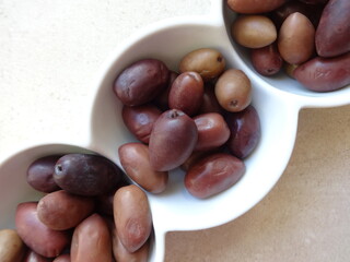 Greek Olives in a Modern White Ceramic Cup