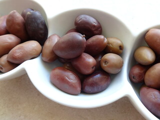 Greek Olives in a Modern White Ceramic Cup