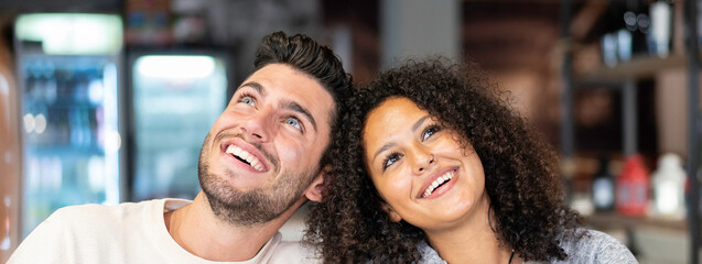 Horizontal banner or header with happy multiracial couple of lover - Funny situation with both man...