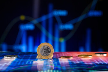 Brazilian money  over a financial chart, symbol of economy and financial market