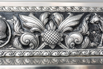 Engraving silver craft work in temple.Traditional art of Chiang Mai/Lanna,Thailand.