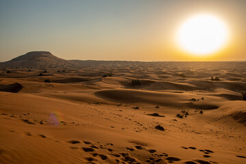 Sunset in the desert dunes of Dubai