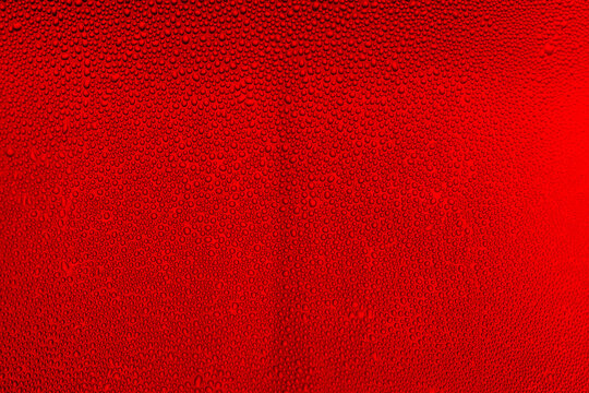 Ice cold glass fresh coca cola covered with water drops condensation Cold drink Drops of water cola drink background Raindrops texture Close up 