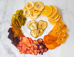 various multicolored dried fruits, top view