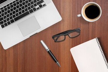 2022 Goal, Plan, Action checklist concept with note pad with laptop, glasses and pen.