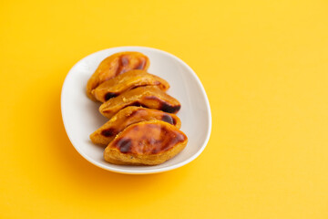 typical portuguese dessert broa castelas on white dish