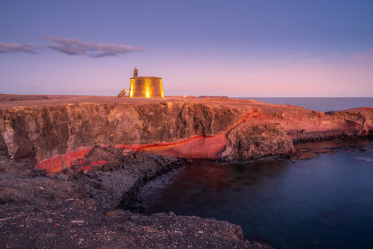 View of Castillo del Aguila o de las Coloradas at dusk, Playa Blanca, Lanzarote, Canary Islands