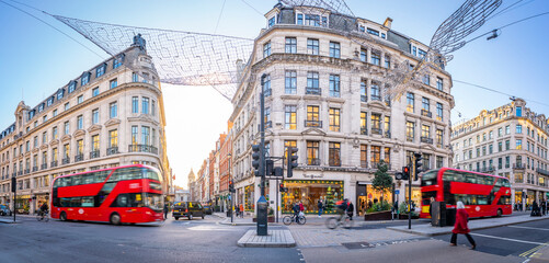 View of red buses on Regent Street at Christmas, London, England