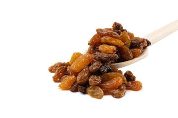  royal raisins on wooden spoon isolated on white background. Spice and food ingredients.