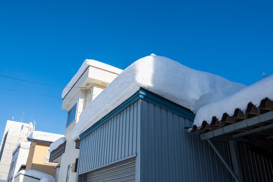 雪が積もった屋根のイメージ  北海道札幌市